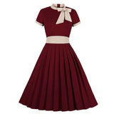 <tc>Años 40</tc> Vestido retro con lazo vintage